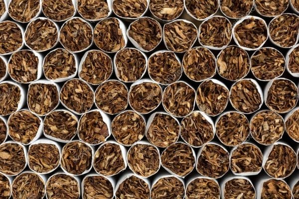 depositphotos_110084296-stock-photo-heap-of-tobacco-cigarettes-front